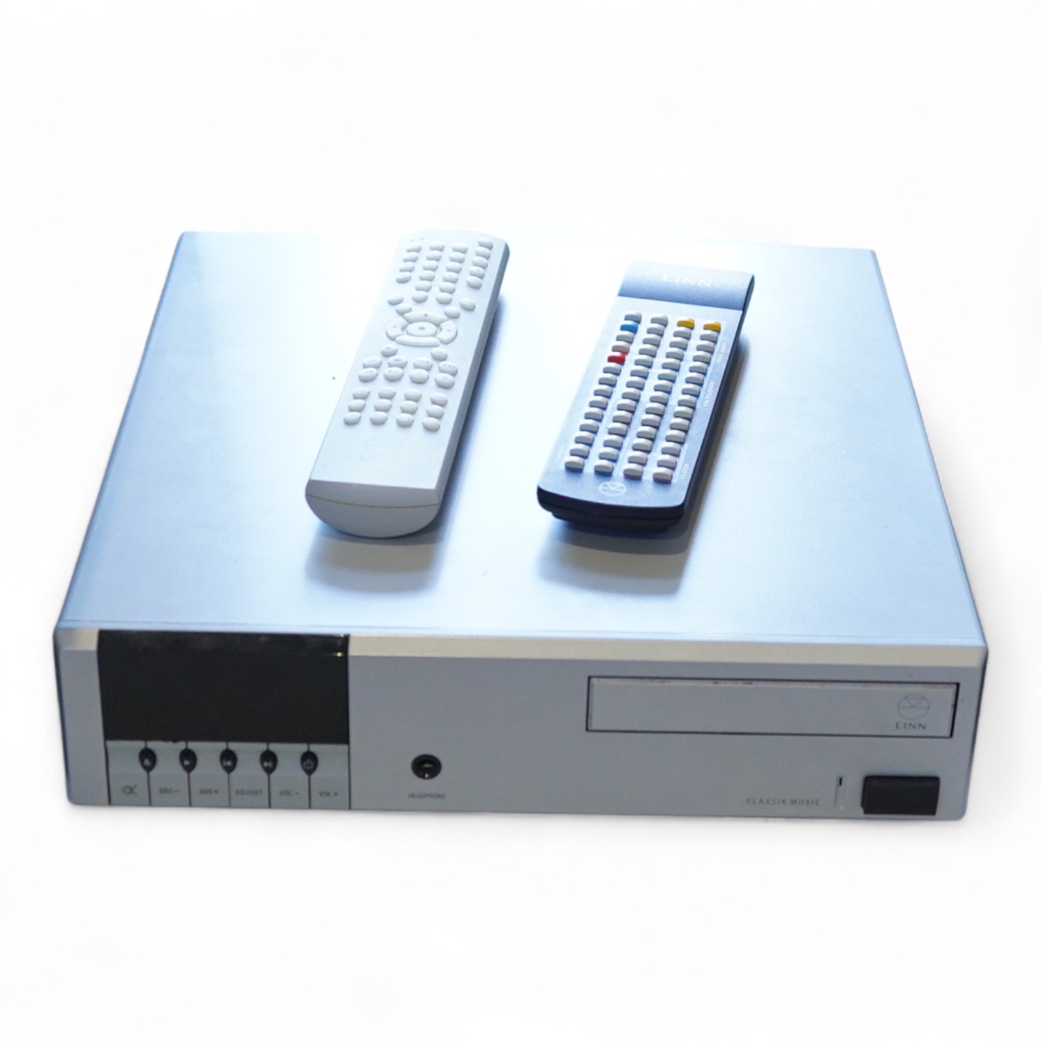 A Linn Classik Music combination CD player, tuner and amplifier in silver finished case, together with two remote controls